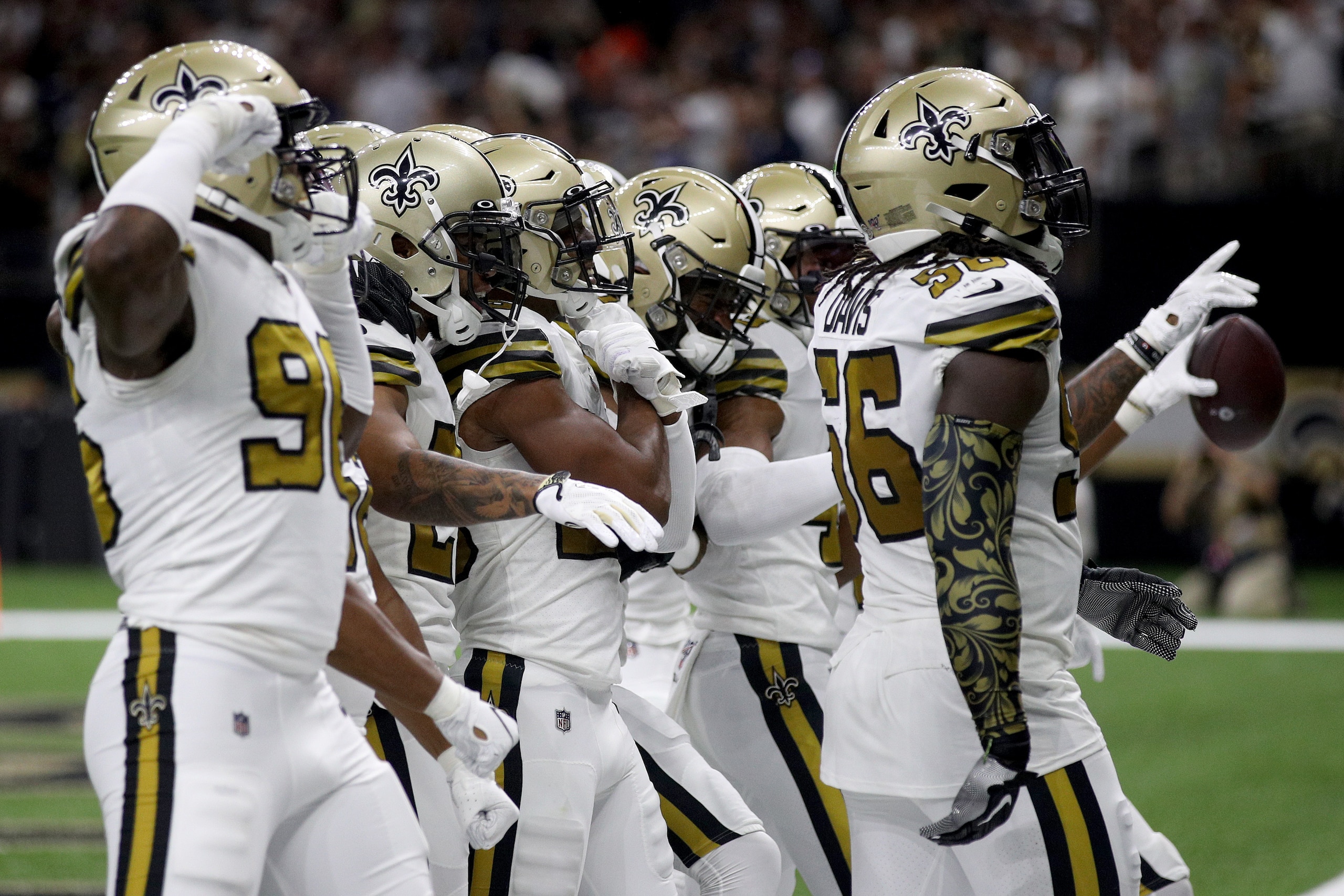 NEW ORLEANS, LOUISIANA - SEPTEMBER 29: The New Orleans Saints celebrate a play against the Dallas Cowboys during the second quarter in the game at Mercedes Benz Superdome on September 29, 2019 in New Orleans, Louisiana. (Photo by Chris Graythen/Getty Images)