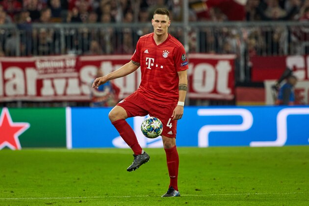 MUNICH, GERMANY - SEPTEMBER 18: Niklas Suele of FC Bayern Muenchen controls the ball during the UEFA Champions League group B match between Bayern Muenchen and Crvena Zvezda at Allianz Arena on September 18, 2019 in Munich, Germany. (Photo by TF-Images/Getty Images)