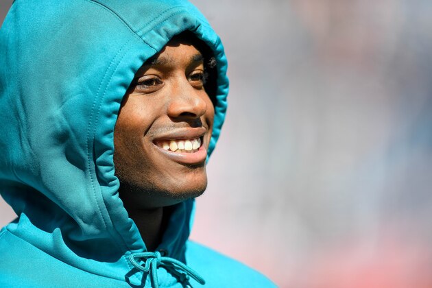 DENVER, CO - SEPTEMBER 29:  Jalen Ramsey #20 of the Jacksonville Jaguars stands on the sideline in street clothes as players warm up before a game against the Denver Broncos at Empower Field at Mile High on September 29, 2019 in Denver, Colorado. (Photo by Dustin Bradford/Getty Images)