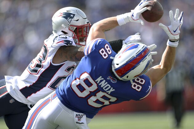 Buffalo Bills tight end Dawson Knox (88) catches a pass in front of New England Patriots safety Patrick Chung in the first half of an NFL football game, Sunday, Sept. 29, 2019, in Orchard Park, N.Y. (AP Photo/Ron Schwane)