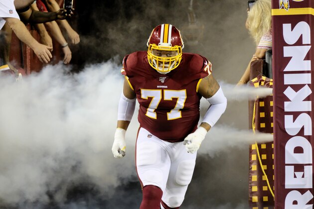 Washington Redskins offensive tackle Ereck Flowers runs onto the field prior to during an NFL football game against the Chicago Bears, Monday, Sept. 23, 2019, in Landover, Md. (AP Photo/Mark Tenally)