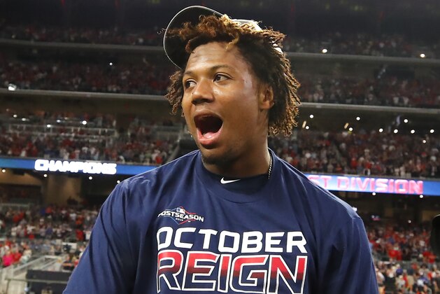 ATLANTA, GA - SEPTEMBER 20: Ronald Acuna Jr. #13 of the Atlanta Braves reacts at the conclusion of an MLB game against the San Francisco Giants in which they clinched the NL East at SunTrust Park on September 20, 2019 in Atlanta, Georgia. (Photo by Todd Kirkland/Getty Images)