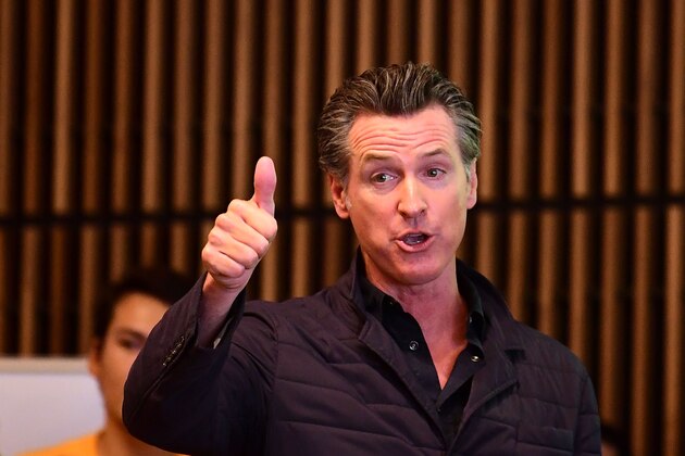 California Governor Gavin Newsom gives a thumbs up during a visit to East Los Angeles College on August 29, 2019 in Monterey Park, California. - Newsom spoke about the California College Promise Program, which will provide two free years of community college to any first-time, full-time California student. (Photo by Frederic J. BROWN / AFP)        (Photo credit should read FREDERIC J. BROWN/AFP/Getty Images)