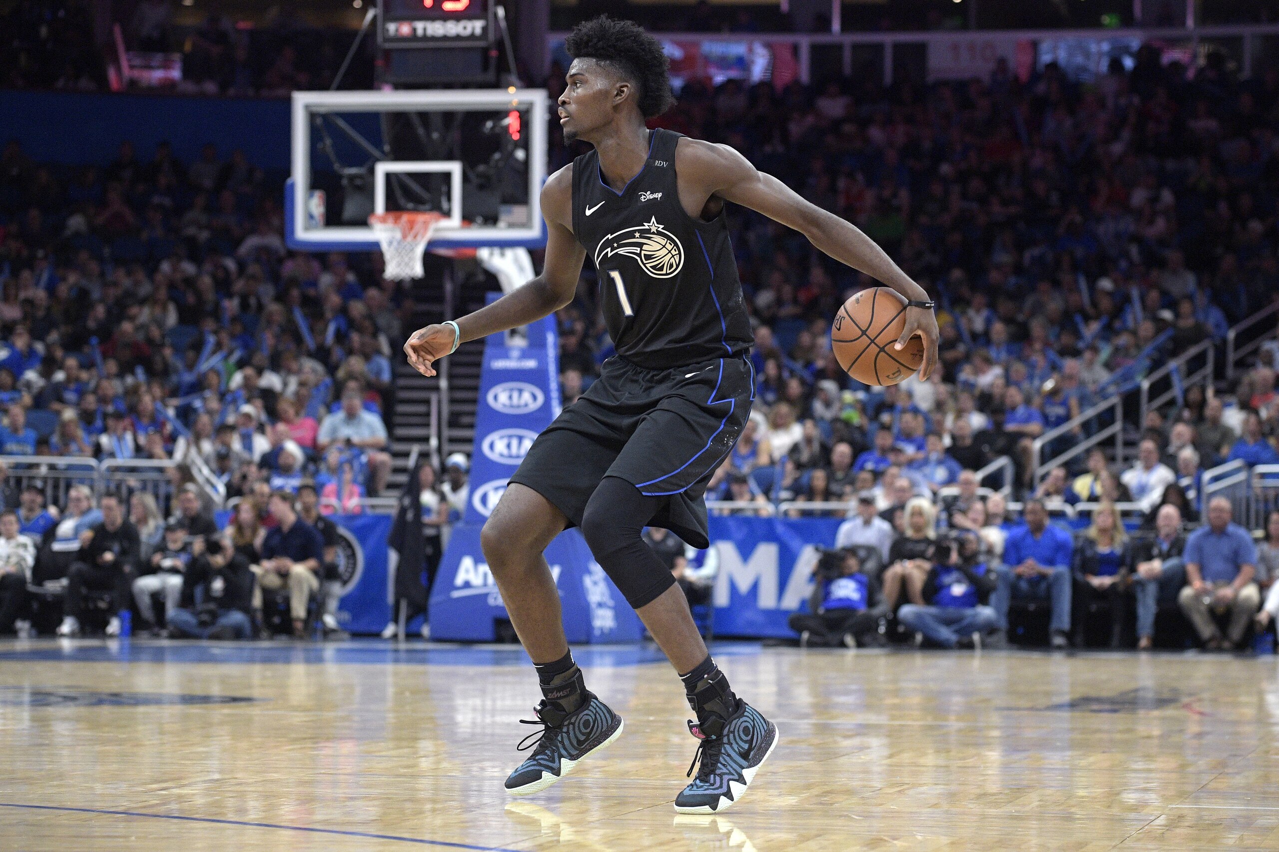 Orlando Magic forward Jonathan Isaac (1) sets up for a shot during the second half of an NBA basketball game against the New Orleans Pelicans Wednesday, March 20, 2019, in Orlando, Fla. (AP Photo/Phelan M. Ebenhack)
