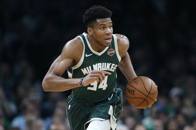 Milwaukee Bucks' Giannis Antetokounmpo brings the ball up court during the first half of Game 4 of a second round NBA basketball playoff series against the Boston Celtics in Boston, Monday, May 6, 2019. (AP Photo/Michael Dwyer)