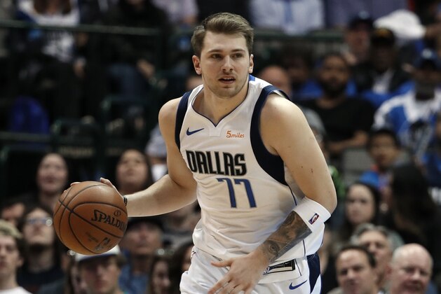 Dallas Mavericks forward Luka Doncic advances the ball up court during an NBA basketball game against the New Orleans Pelicans in Dallas, Monday, March 18, 2019. (AP Photo/Tony Gutierrez)