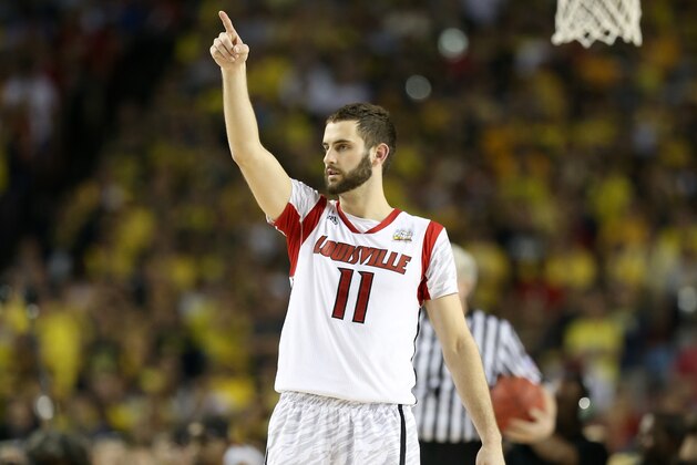 ATLANTA, GA - APRIL 08:  Luke Hancock #11 of the Louisville Cardinals reacts in the secon dhalf against the Michigan Wolverines during the 2013 NCAA Men's Final Four Championship at the Georgia Dome on April 8, 2013 in Atlanta, Georgia.  (Photo by Streeter Lecka/Getty Images)