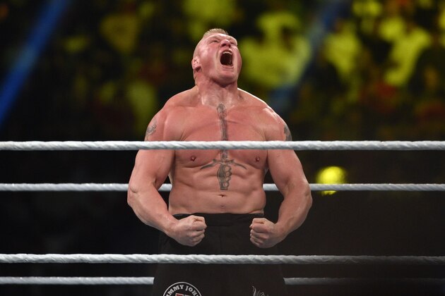 Brock Lesnar celebrates after winning the WWE Universal Championship match as part of as part of the World Wrestling Entertainment (WWE) Crown Jewel pay-per-view at the King Saud University Stadium in Riyadh on November 2, 2018. (Photo by Fayez Nureldine / AFP)        (Photo credit should read FAYEZ NURELDINE/AFP/Getty Images)
