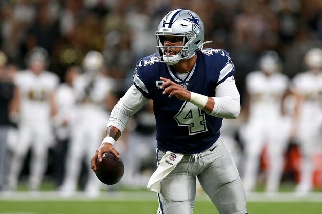 NEW ORLEANS, LOUISIANA - SEPTEMBER 29: Dak Prescott #4 of the Dallas Cowboys scrambles out ot the pocket during the first half of a NFL game against the New Orleans Saints at the  Mercedes Benz Superdome on September 29, 2019 in New Orleans, Louisiana. (Photo by Sean Gardner/Getty Images)