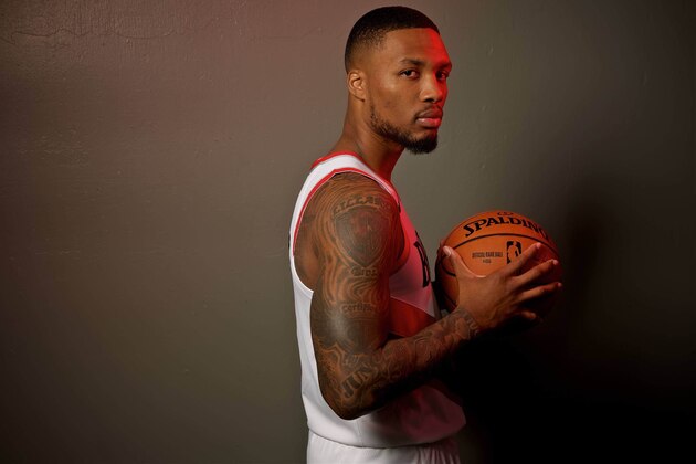 Portland Trail Blazers guard Damian Lillard poses during the NBA basketball team's media day at the Moda Center in Portland, Ore., Monday, Sept. 30, 2019. (AP Photo/Sam Ortega)