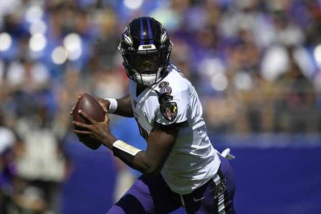Baltimore Ravens quarterback Lamar Jackson looks for a receiver in the first half of an NFL football game against the Arizona Cardinals, Sunday, Sept. 15, 2019, in Baltimore. (AP Photo/Nick Wass)