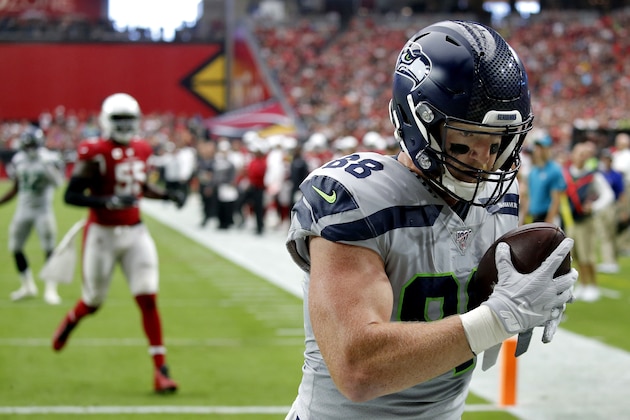 Seattle Seahawks tight end Will Dissly (88) pulls in a touchdown pass against the Arizona Cardinals during the first half of an NFL football game, Sunday, Sept. 29, 2019, in Glendale, Ariz. (AP Photo/Ross D. Franklin)