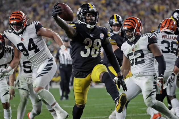 Pittsburgh Steelers running back Jaylen Samuels (38) scores on a 2-yard run during the second half of an NFL football game against the Cincinnati Bengals in Pittsburgh, Monday, Sept. 30, 2019. (AP Photo/Don Wright)