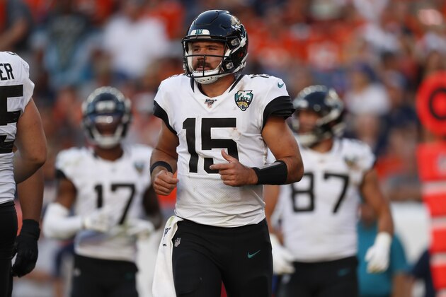 Jacksonville Jaguars quarterback Gardner Minshew runs onto the field during the second half of an NFL football game against the Denver Broncos, Sunday, Sept. 29, 2019, in Denver. (AP Photo/David Zalubowski)