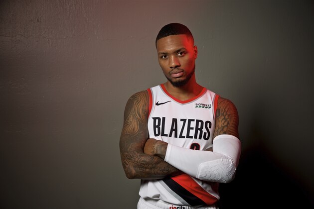 Portland Trail Blazers guard Damian Lillard poses during the NBA basketball team's media day at the Moda Center in Portland, Ore., Monday, Sept. 30, 2019. (AP Photo/Sam Ortega)