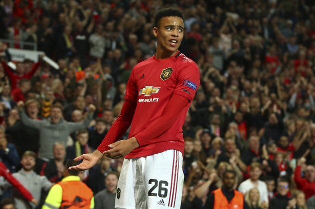 Manchester United's Mason Greenwood celebrates scoring his sides first goal during the Europa League Group L soccer match between Manchester United and Astana at Old Trafford stadium in Manchester, England Thursday, Sept. 19, 2019. (AP Photo/Dave Thompson)