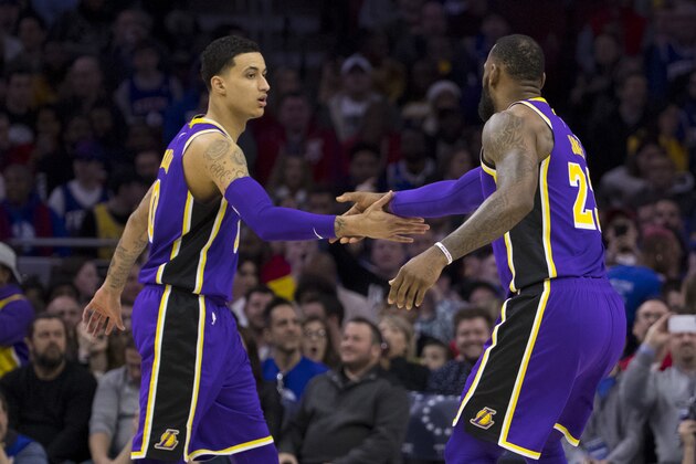PHILADELPHIA, PA - FEBRUARY 10: Kyle Kuzma #0 and LeBron James #23 of the Los Angeles Lakers react against the Philadelphia 76ers at the Wells Fargo Center on February 10, 2019 in Philadelphia, Pennsylvania. The 76ers defeated the Lakers 143-120. NOTE TO USER: User expressly acknowledges and agrees that, by downloading and or using this photograph, User is consenting to the terms and conditions of the Getty Images License Agreement.(Photo by Mitchell Leff/Getty Images)
