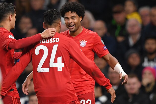 Bayern Munich's German midfielder Serge Gnabry (R) celebrates with teammates after he scores their fourth goal during the UEFA Champions League Group B football match between Tottenham Hotspur and Bayern Munich at the Tottenham Hotspur Stadium in north London, on October 1, 2019. (Photo by DANIEL LEAL-OLIVAS / AFP) (Photo by DANIEL LEAL-OLIVAS/AFP via Getty Images)