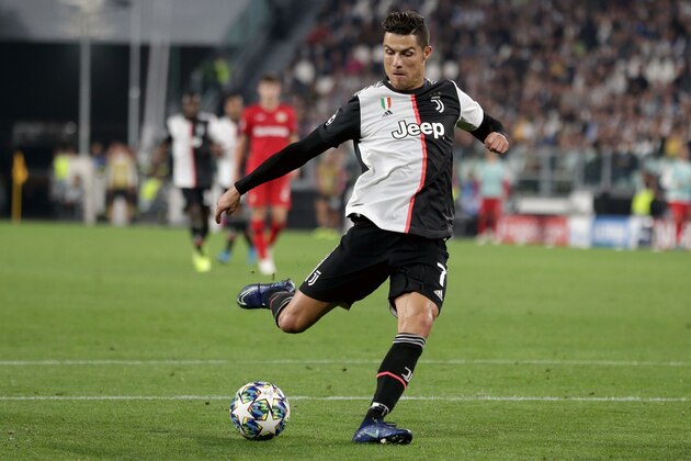 TURIN, ITALY - OCTOBER 01: Christiano Ronaldo of Juventus Turin controls the ball during the UEFA Champions League group D match between Juventus and Bayer Leverkusen at Juventus Arena on October 1, 2019 in Turin, Italy. (Photo by TF-Images/Getty Images)