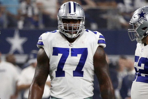 Dallas Cowboys offensive tackle Tyron Smith (77) prepares to line up against the New York Giants during the first half of an NFL football game in Arlington, Texas, Sunday, Sept. 16, 2018. (AP Photo/Michael Ainsworth)