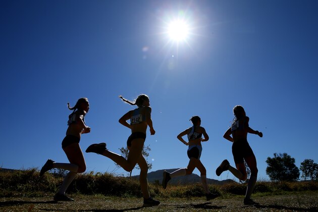 SYDNEY, AUSTRALIA - AUGUST 24: Competitors race in the Girls 13 years 3k U14 event during the Australian Cross-Country Championships at Kembla Grange on August 24, 2019 in Wollongong, Australia. (Photo by Jason McCawley/Getty Images)