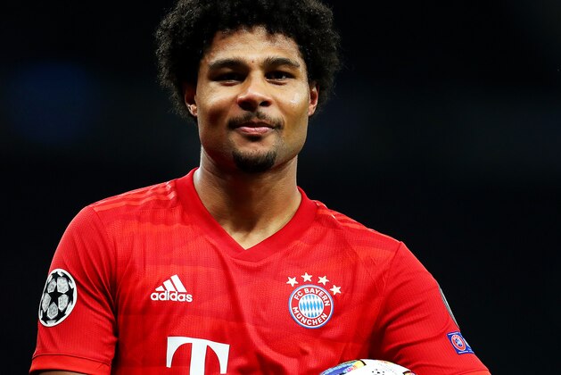 LONDON, ENGLAND - OCTOBER 01: Serge Gnabry of FC Bayern Munich celebrates with the match ball at full-time after scoring four goals in the UEFA Champions League group B match between Tottenham Hotspur and Bayern Muenchen at Tottenham Hotspur Stadium on October 01, 2019 in London, United Kingdom. (Photo by Catherine Ivill/Getty Images)