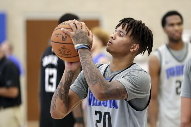 Orlando Magic guard Markelle Fultz lies up a shot during an NBA basketball practice, Tuesday, Oct. 1, 2019, in Orlando, Fla. (AP Photo/John Raoux)