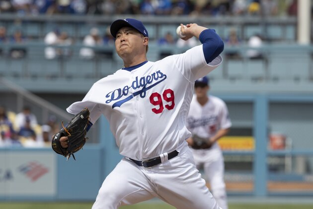 Los Angeles Dodgers starting pitcher Hyun—Jin Ryu throws to  Colorado Rockies' Trevor Story during the first inning of a baseball game in Los Angeles, Sunday, Sept. 22, 2019. (AP Photo/Sam Gangwer )