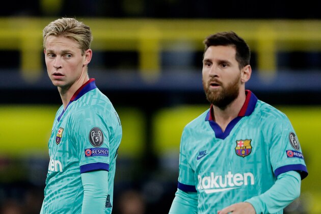 DORTMUND, GERMANY - SEPTEMBER 17: (L-R) Frenkie de Jong of FC Barcelona, Lionel Messi of FC Barcelona during the UEFA Champions League  match between Borussia Dortmund v FC Barcelona at the Signal Iduna Park on September 17, 2019 in Dortmund Germany (Photo by Laurens Lindhout/Soccrates/Getty Images)