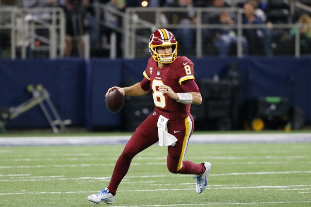 Washington Redskins quarterback Kirk Cousins (8) rolls out of the pocket to pass during an NFL football game against the Dallas Cowboys on Thursday, Nov. 30, 2017, in Arlington, Texas. (AP Photo/Roger Steinman)