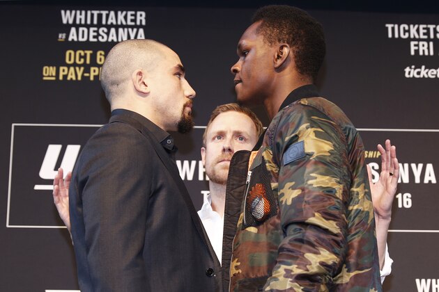 MELBOURNE, AUSTRALIA - AUGUST 15: Robert Whittaker (L) faces off with Israel Adesanya (R) during a UFC Australia press conference at Federation Square on August 15, 2019 in Melbourne, Australia. (Photo by Daniel Pockett/Zuffa LLC/Zuffa LLC via Getty Images)