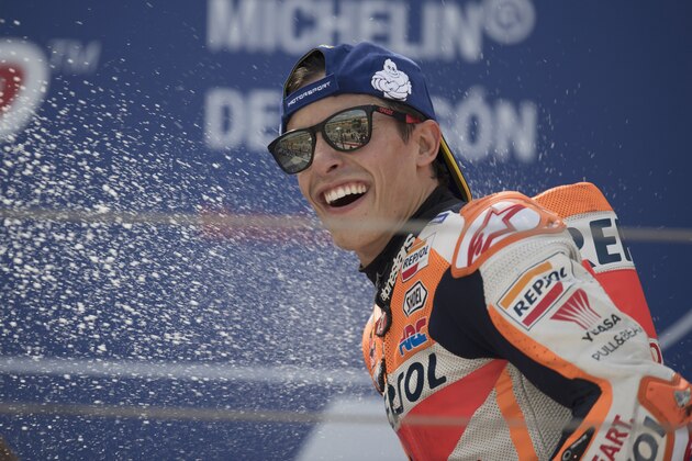 ALCANIZ, SPAIN - SEPTEMBER 22: Marc Marquez of Spain and Repsol Honda Team celebrates the victory on the podium at the end of the MotoGP race during the MotoGp of Aragon - Race on September 22, 2019 in Alcaniz, Spain. (Photo by Mirco Lazzari gp/Getty Images)