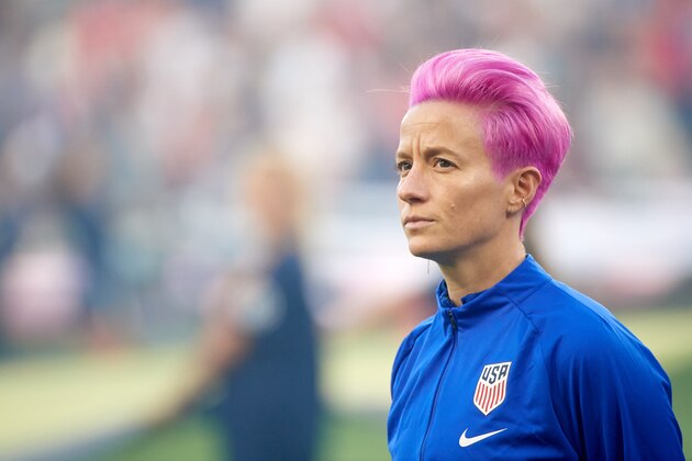 ST PAUL, MINNESOTA - SEPTEMBER 03: Megan Rapinoe #15 of the United States looks on during the National Anthem before the USWNT Victory Tour friendly match against Portugal at Allianz Field on September 03, 2019 in St. Paul, Minnesota. The United States defeated Portugal 3-0. (Photo by Hannah Foslien/Getty Images)