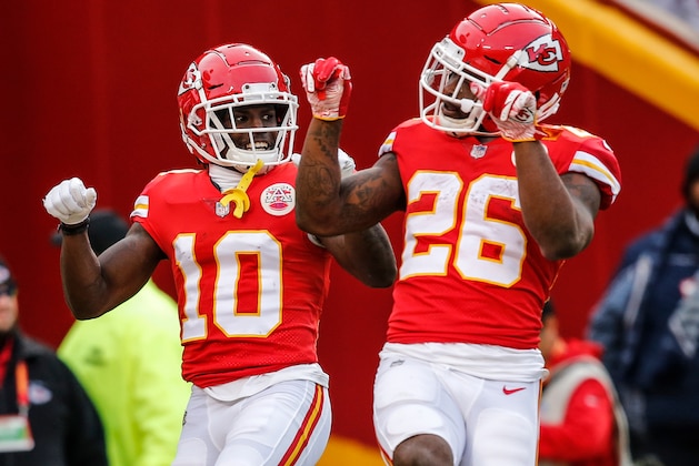 KANSAS CITY, MO - DECEMBER 30: Tyreek Hill #10 of the Kansas City Chiefs and teammate Damien Williams #26 celebrate the game's first touchdown during the first quarter of the game against the Oakland Raiders at Arrowhead Stadium on December 30, 2018 in Kansas City, Missouri. (Photo by David Eulitt/Getty Images)