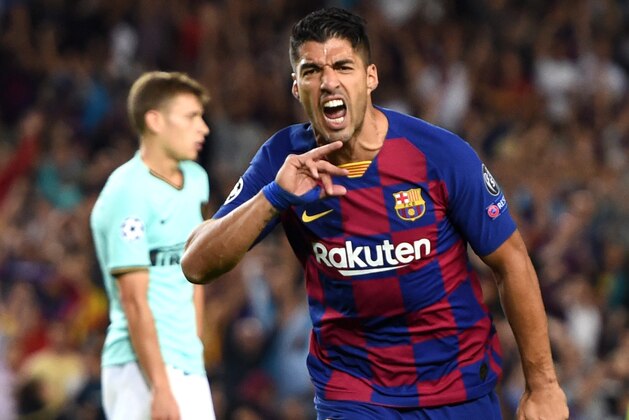 BARCELONA, SPAIN - OCTOBER 02: Luis Suarez of FC Barcelona celebrates after scoring his sides first goal during the UEFA Champions League group F match between FC Barcelona and FC Internazionale at Camp Nou on October 02, 2019 in Barcelona, Spain. (Photo by Alex Caparros/Getty Images)