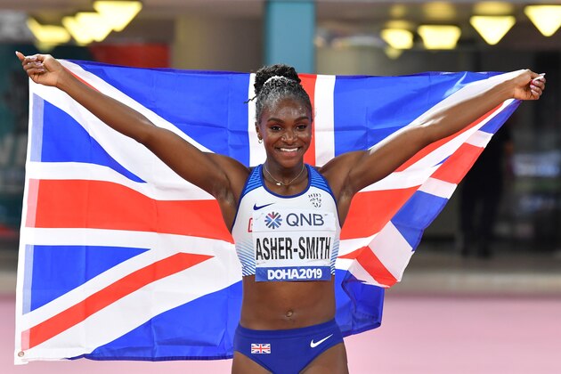 Britain's Dina Asher-Smith celebrates after winning the Women's 200m final at the 2019 IAAF Athletics World Championships at the Khalifa International stadium in Doha on October 2, 2019. (Photo by ANDREJ ISAKOVIC / AFP) (Photo by ANDREJ ISAKOVIC/AFP via Getty Images)