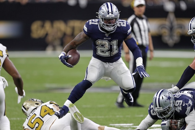 Dallas Cowboys running back Ezekiel Elliott (21) carries over New Orleans Saints outside linebacker Kiko Alonso (54) in the first half of an NFL football game in New Orleans, Sunday, Sept. 29, 2019. (AP Photo/Bill Feig)