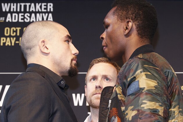 MELBOURNE, AUSTRALIA - AUGUST 15: Robert Whittaker (L) faces off with Israel Adesanya (R) during a UFC Australia press conference at Federation Square on August 15, 2019 in Melbourne, Australia. (Photo by Daniel Pockett/Zuffa LLC/Zuffa LLC via Getty Images)