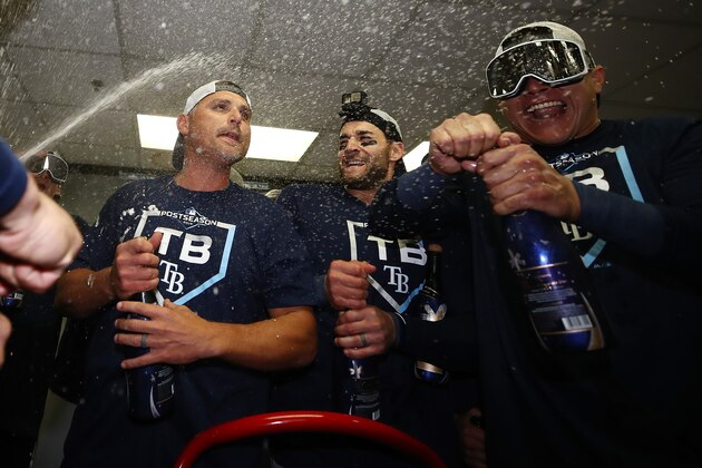OAKLAND, CALIFORNIA - OCTOBER 02: Kevin Cash #16 of the Tampa Bay Rays celebrates in the locker room after defeating the Oakland Athletics 5-1 in the American League Wild Card Game at RingCentral Coliseum on October 02, 2019 in Oakland, California. (Photo by Ezra Shaw/Getty Images)