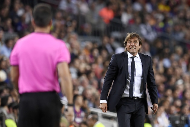 Inter Milan's Italian coach Antonio Conte protests to a referee during the UEFA Champions League Group F football match between Barcelona and Inter Milan at the Camp Nou stadium in Barcelona, on October 2, 2019. (Photo by Josep LAGO / AFP) (Photo by JOSEP LAGO/AFP via Getty Images)