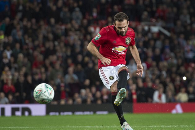 MANCHESTER, ENGLAND - SEPTEMBER 25: Juan Mata of Manchester United takes a shoot out penalty during the Carabao Cup Third Round match between Manchester United and Rochdale at Old Trafford on September 25, 2019 in Manchester, England. (Photo by Visionhaus/Getty Images)