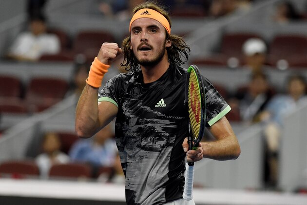 Stefanos Tsitsipas of Greece celebrates a point during his men's singles second round match against Nikoloz Basilashvili of Georgia at the China Open tennis tournament in Beijing on October 3, 2019. (Photo by Leo RAMIREZ / AFP) (Photo by LEO RAMIREZ/AFP via Getty Images)