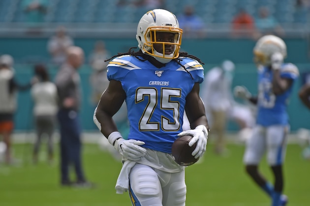 MIAMI, FL - SEPTEMBER 29: Melvin Gordon #25 of the Los Angeles Chargers in action during pregame before the start of the game against the Miami Dolphins at Hard Rock Stadium on September 29, 2019 in Miami, Florida. (Photo by Eric Espada/Getty Images)