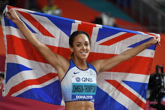 Britain's Katarina Johnson-Thompson celebrates after winning the Women's Heptathlon at the 2019 IAAF Athletics World Championships at the Khalifa International stadium in Doha on October 3, 2019. (Photo by Kirill KUDRYAVTSEV / AFP) (Photo by KIRILL KUDRYAVTSEV/AFP via Getty Images)