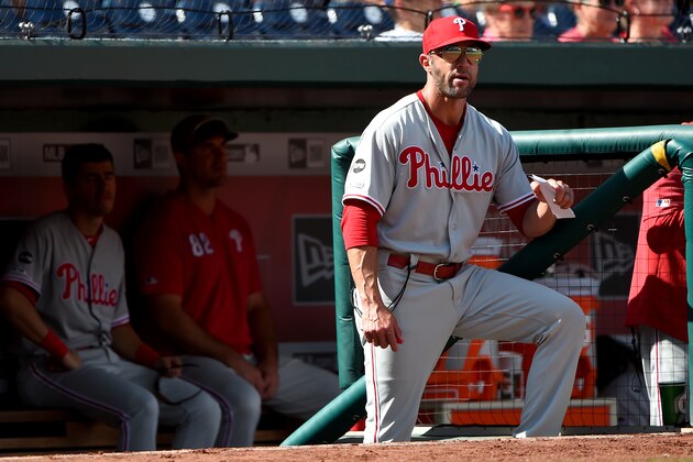 WASHINGTON, DC - SEPTEMBER 24: Manager Gabe Kapler #19 of the Philadelphia Phillies looks on from the dugout during game one of a doubleheader against the Washington Nationals at Nationals Park on September 24, 2019 in Washington, DC. (Photo by Will Newton/Getty Images)