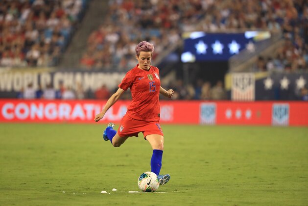 CHARLOTTE, NORTH CAROLINA - OCTOBER 03: Megan Rapinoe #15 of United States takes a kick against the Korea Republic during their game at Bank of America Stadium on October 03, 2019 in Charlotte, North Carolina. (Photo by Streeter Lecka/Getty Images)