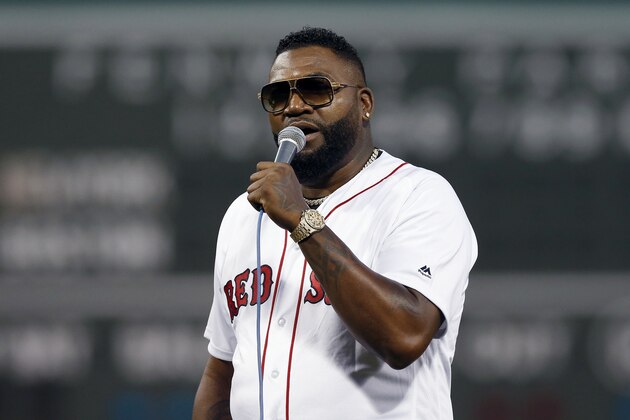 Former Boston Red Sox's David Ortiz address the crowd after throwing out the ceremonial first pitch before a baseball game against the New York Yankees in Boston, Monday, Sept. 9, 2019. (AP Photo/Michael Dwyer)