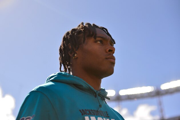 DENVER, CO - SEPTEMBER 29:  Jalen Ramsey #20 of the Jacksonville Jaguars walks onto the field in street clothes before a game against the Denver Broncos at Empower Field at Mile High on September 29, 2019 in Denver, Colorado. (Photo by Dustin Bradford/Getty Images)