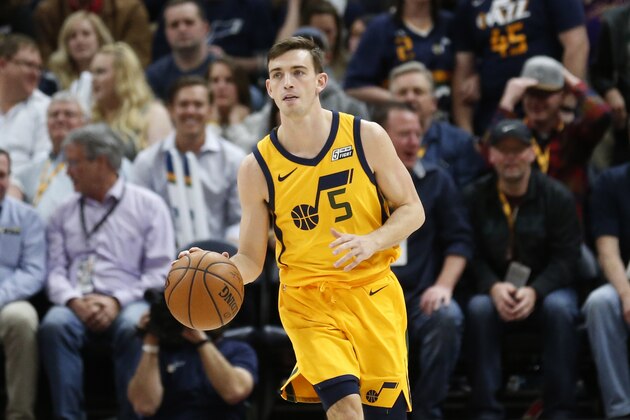 Utah Jazz guard David Stockton (5) brings the ball up court in the second half during an NBA basketball game against the Los Angeles Clippers Thursday, April 5, 2018, in Salt Lake City. (AP Photo/Rick Bowmer)
