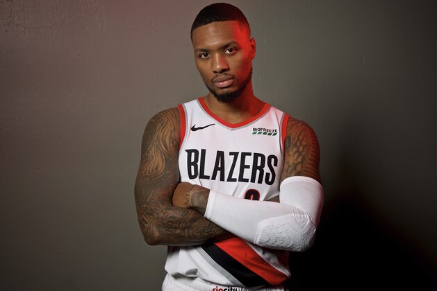 Portland Trail Blazers guard Damian Lillard poses during the NBA basketball team's media day at the Moda Center in Portland, Ore., Monday, Sept. 30, 2019. (AP Photo/Sam Ortega)